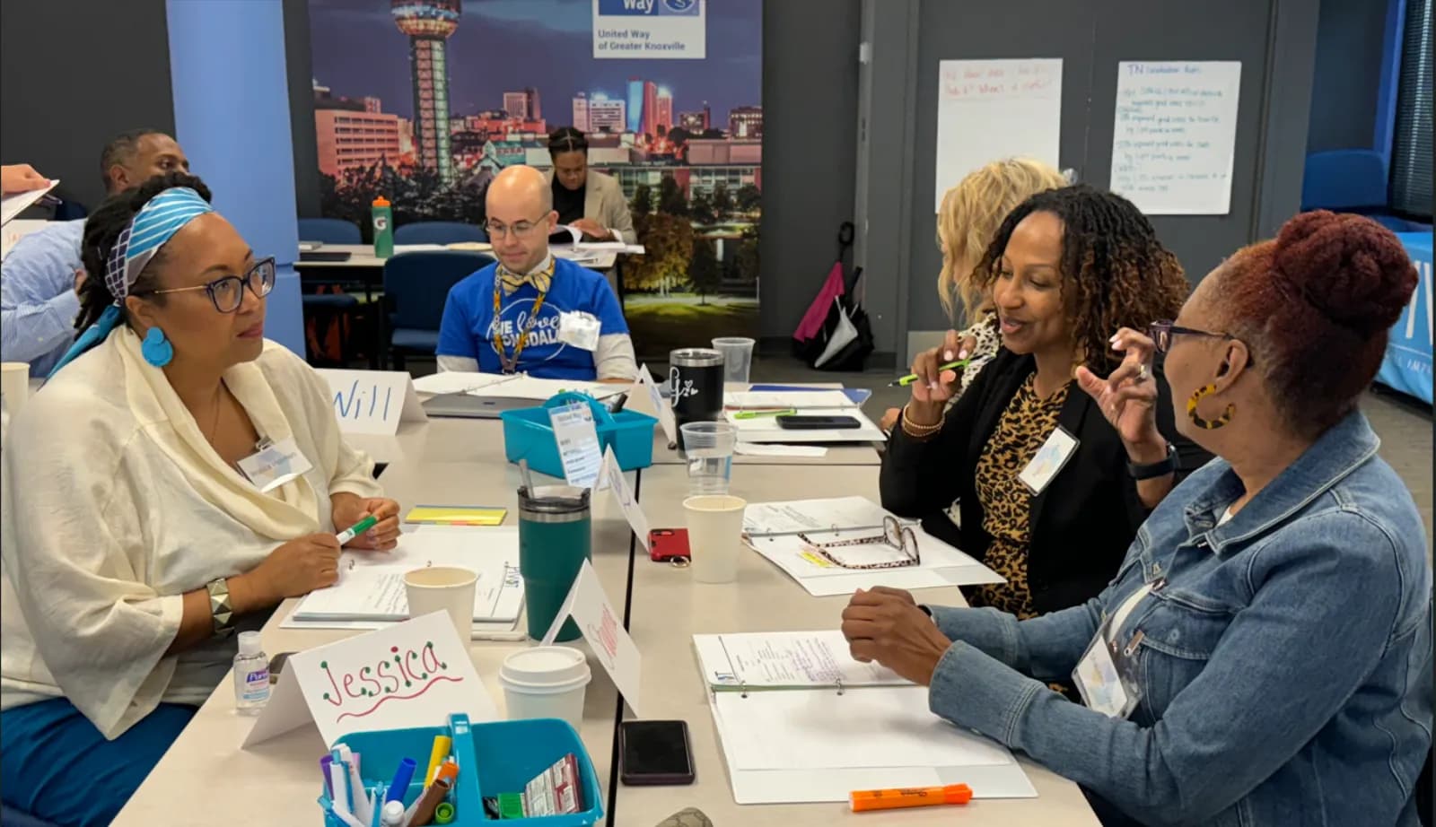 Principal cohort members gathered for a collaborative leadership development session